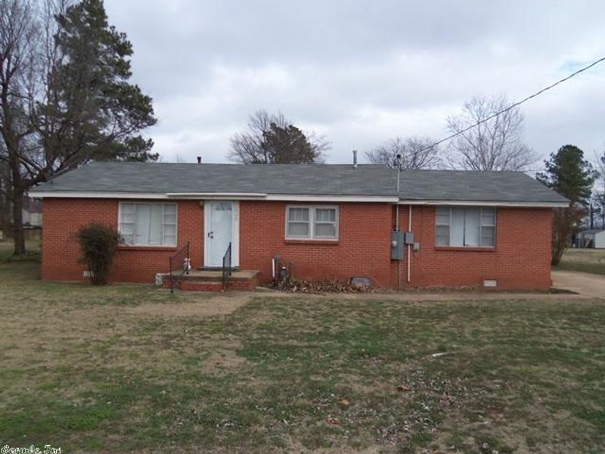 Very nice three bedroom, one bath home. Must see to appreciate.  Home features all brick, with vinyl siding on gables making home very maintenance free.  Home has new carpet in bedrooms, vinyl in bathroom and laminate in living room. Also features new all up to date paint, Kitchen has been totally remodeled with all new Oak cabinets. New roof this year, and new central heat and air with in past five years.  Home is setting on three Lots. Please call or Text to setup a time to view the home.