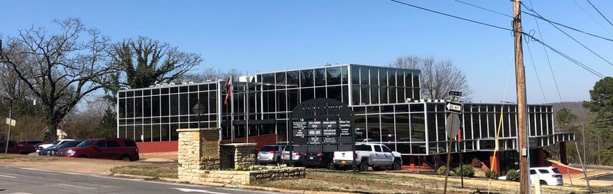 These suites are leased on a 3-year agreement.  Located in historic Batesville, Arkansas, this beautiful, glass-sided building has been totally remodeled with new roof, updated efficient HVAC system, solar blinds, and completely retrofitted with LED lighting. Office spaces range from 250 SF to 4000 SF, and building has on-site management. High occupancy with diverse and stable tenant base, including a Fortune 500 company, a premier local banking institution, counseling services, a state agency, a CPA firm, and an internationally owned P.O.S. company!