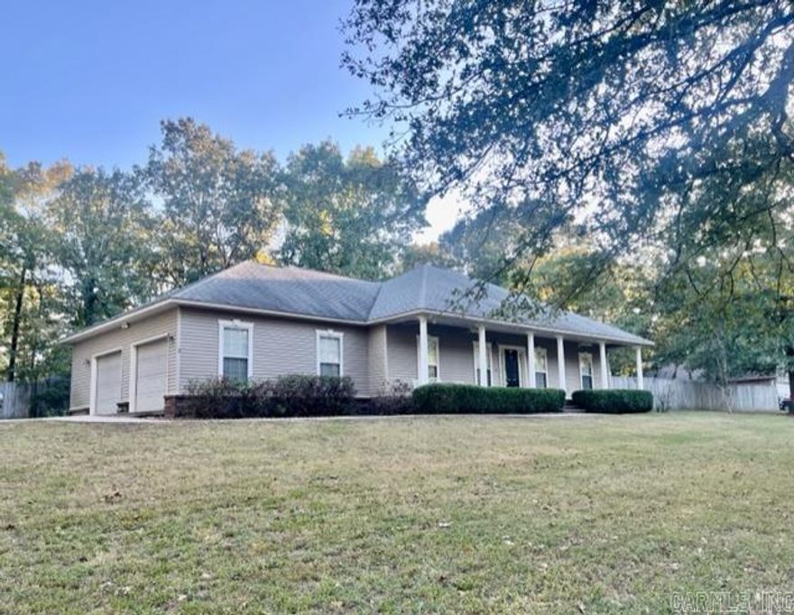 This Saline County family home sits on an acre in a wonderful family neighborhood, Pear Orchard. Not many homes are offered for sale in this distinguished development. There is a country sized front porch and covered back patio to enjoy the beautiful yard with lots of privacy. The open and split floor plan has a formal dining room, large great room with a cozy gas fireplace, a breakfast area, and a large kitchen with granite counter tops and an island with a bar. The primary bedroom suite is large with a sitting area, dressing table, corner tub, and separate shower. The secondary bedrooms are large with nice closet space. Located in the Sheridan Schools District, one of the best districts in the state. Only 20 minutes to Downtown Little Rock.