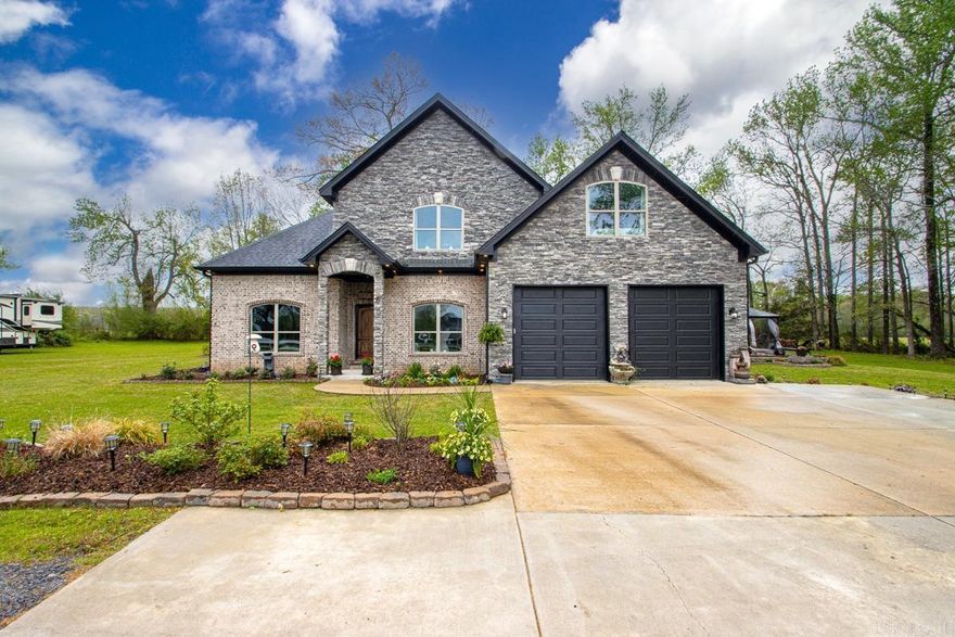 Welcome Home, to this country home sitting on 2.47 acres in a gated community of Annis Estates. You will love the open floor plan with vaulted ceilings with custom build-ins.Kitchen features double ovens and a gas range,granite counter tops.Upstairs is a loft perfect for a gaming area.The back patio ia a real treat for entertaining friends and family. Must See!!