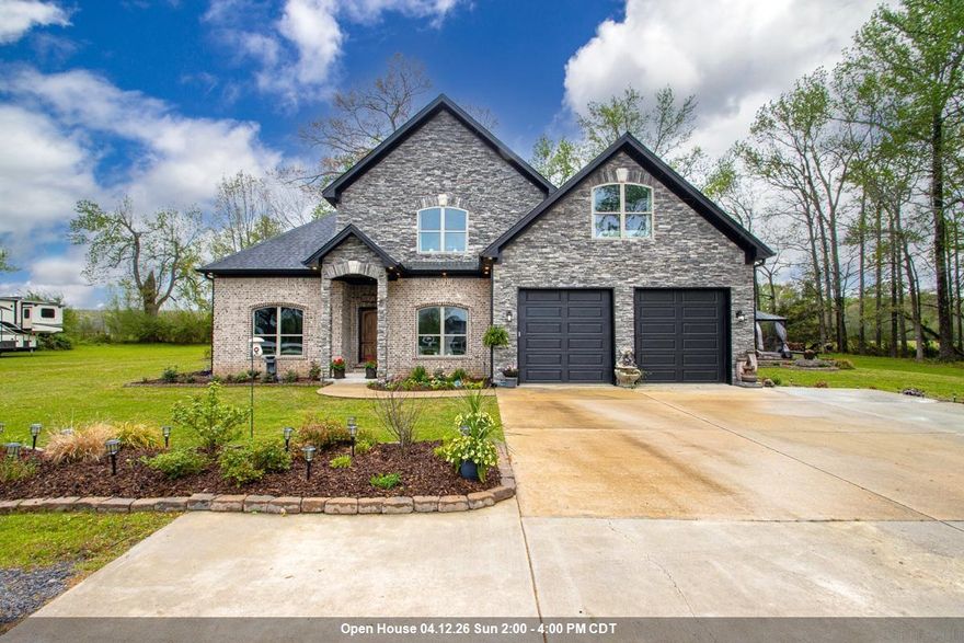 Welcome Home, to this country home sitting on 2.47 acres in a gated community of Annis Estates. You will love the open floor plan with vaulted ceilings with custom build-ins.Kitchen features double ovens and a gas range,granite counter tops.Upstairs is a loft perfect for a gaming area.The back patio ia a real treat for entertaining friends and family. Must See!!