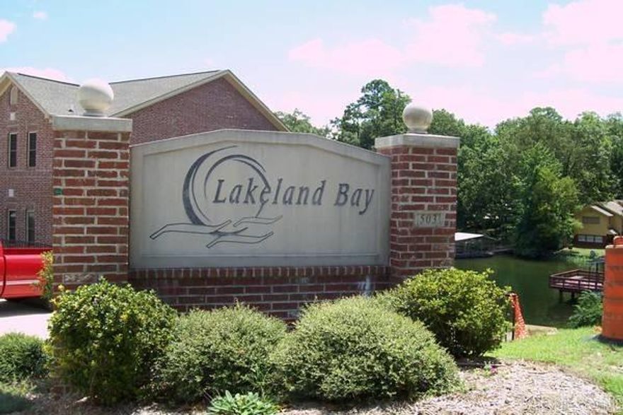 Very nice luxury condo on Lake Hamilton just off Central Ave and close to everything! Condo is end unit and downstairs where you can walk out directly to water and boardwalk! 2 Bedrooms and 2.5 Baths! Granite Counters, SS Appliances, Washer & Dryer in Laundry Room. Tall ceilings with crown mold throughout! separate ice-maker by sink! FP has Gas Logs!  Available Now! 1 year Lease Required.  We also have 2 other walk in condos for Lease in Lakeland Bay!  (The inside pics are of another condo. Colors will vary