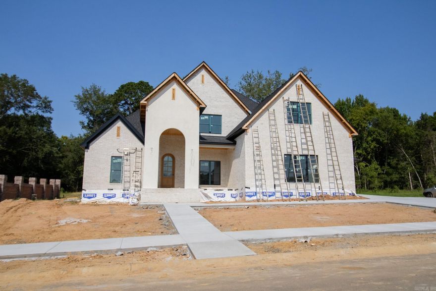 Stunning new construction custom home in Lands End. Stunning white oak cabinetry, full round arches throughout, and gorgeous tile finishes. Modern living at its finest!