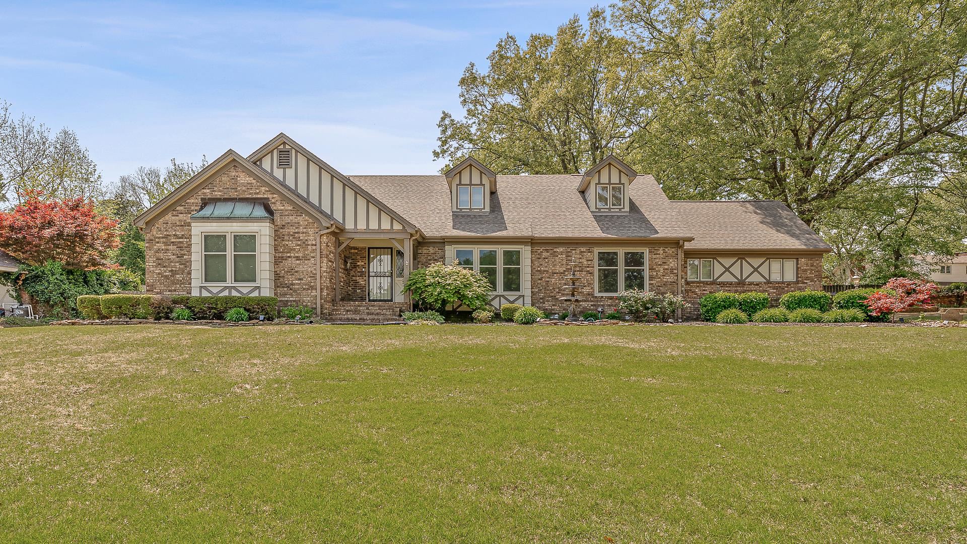 This beautifully maintained home on Melton Circle offers over 3,400 sq. ft. of comfortable living space with thoughtful updates throughout. The spacious layout includes four large bedrooms, three full baths, and a convenient half bath. The primary suite is located on the main level for added comfort. In 2021, the home received several upgrades, including new hardwood flooring, stair carpeting, and a full kitchen remodel featuring a brick-arched gas cooktop, double oven, and updated cabinetry. Fresh paint (SW Shoji White) was added to the living room, great room, and kitchen in December. The large brick fireplace anchors the great room, which flows into formal living and dining areasāideal for both everyday living and entertaining. Step outside to a backyard retreat with a Gunite pool, waterfall feature, retaining wall, and extended patio space. Additional highlights include a double side-entry garage with a storage room, gas heating, and a 400-amp electric service. This centrally located Jonesboro home offers a great blend of style, space, and function.