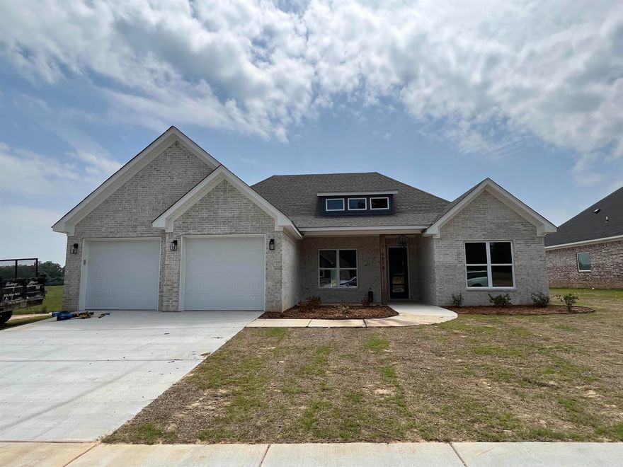 This home is a must see, Great New Construction home in a beautiful new subdivision.Open kitchen with large island, cabinets to ceiling in kitchen, open shelving in kitchen, huge window over kitchen sink overlooking the beautiful backyard, open dining room, brick fireplace, wood beams, large walk in pantry, laundry room connects to the master closet, large primary suite with custom accent wall and wood beams, large primary walk in closet & bath, custom barn door in primary. This home has so many custom features! The backyard is beautiful and backs up to a large field, great view!