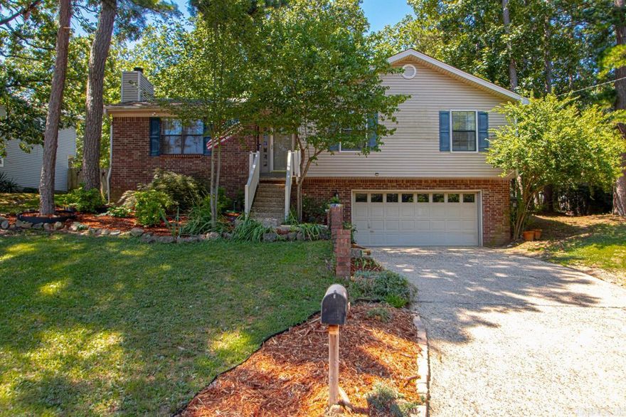 Charming family home located in the highly desired Pleasant Forest neighborhood.  Open concept living/dining areas make for the perfect entertaining space. Inside offers hardwood flooring in the main living areas, carpet in bedrooms and tile in wet areas. Upstairs you will find a great room with fireplace & gas starter, beautiful eat-in kitchen with breakfast nook as well as all bedrooms.  Downstairs features a dedicated laundry space and bonus room! Newer furnace, dishwasher, kitchen tile and fresh paint throughout - this home is truly move-in ready!  Outside is another entertainers haven, featuring two decks and a fenced in backyard! Garage has extra storage and workshop area. Great curb appeal and great location - this gem won't last long!