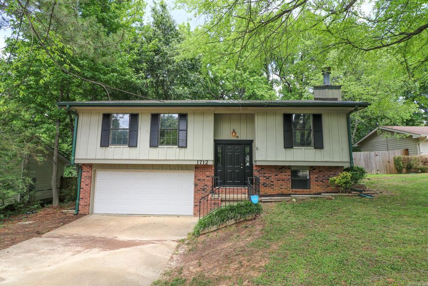 Freshly redone 4 bed, 3 bath home with double garage. New roof, flooring, paint and fixtures! Imagine your family enjoying a peaceful evening on the deck overlooking the tree shaded backyard! Located within walking distance to school and just minutes away from local shopping and amenities. This is a great find on a 4 bedroom 3 bath home at an affordable price in excellent condition!!