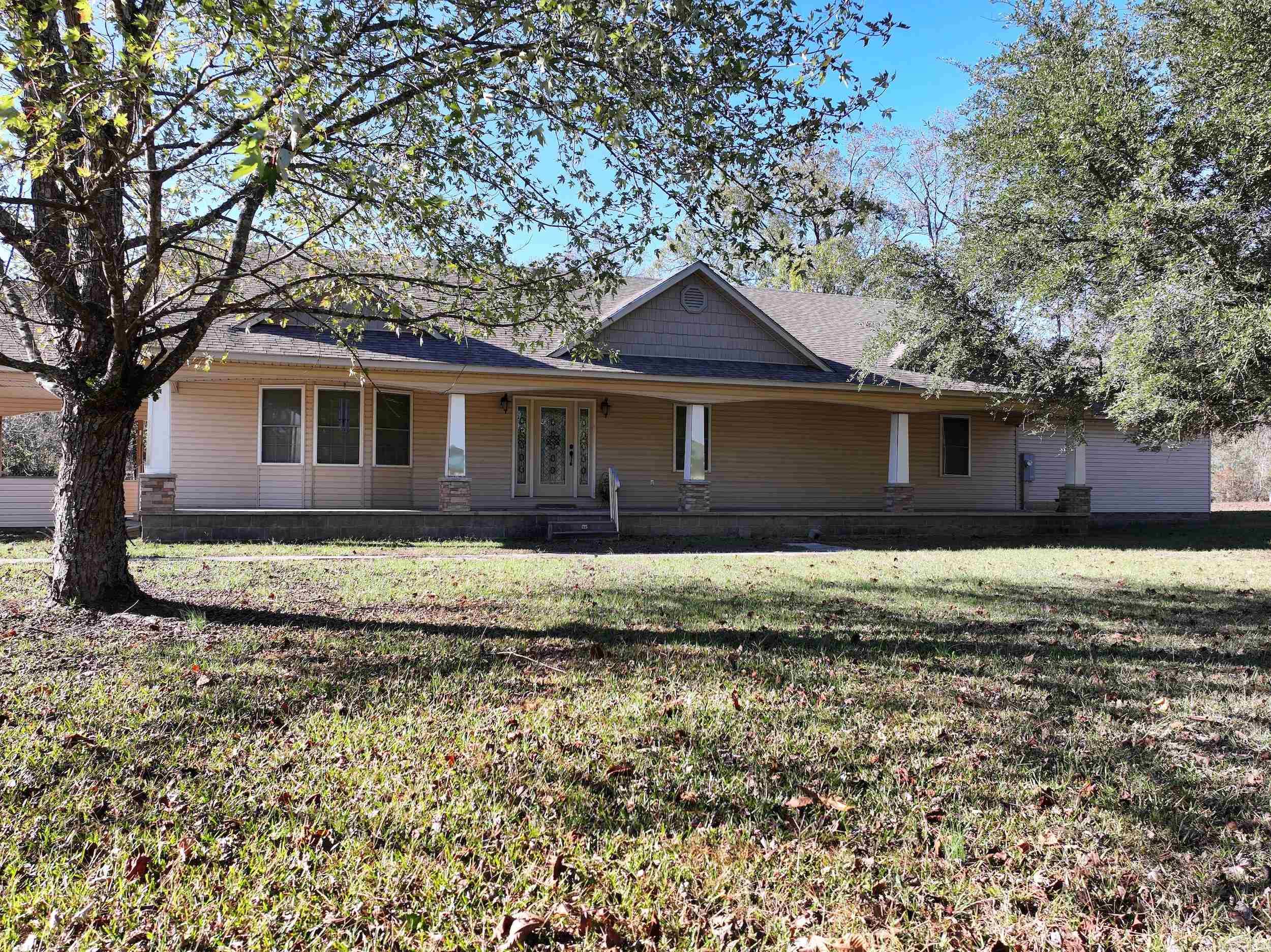 This custom home, approximately 3,871 sq. ft., sits on 4.37± acres with easy access to HWY 70. With 3 bedrooms, 4.5 baths, and thoughtful design throughout, it offers both space and style. The main floor features an open-concept kitchen with a breakfast nook, plus a formal dining room for hosting gatherings. The spacious living room provides plenty of room for relaxation. The primary suite includes a private office space, ideal for remote work or study. An elevator conveniently accesses the finished walk-out basement, which includes additional living space, a safe/storm room, and flexible options for use. Two large shops on the property provide ample room for storage, hobbies, or a home business. The oversized laundry room offers dual washer/dryer hookups for added convenience. With 4.37± acres of land, there’s plenty of space for outdoor activities or relaxation. Designed for modern living, this home combines comfort, functionality, and versatility.