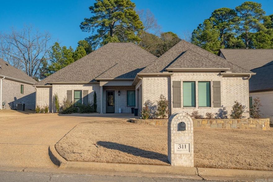 Country Club golf course living in the heart of Arlington Park gated community is move-in ready! From the moment you walk thru the front door you will fall in love with the open floor plan, high ceilings and upgrades throughout. The living area boasts vaulted wood ceilings, gas fireplace, remote control blinds and beautiful wood floors. The open kitchen/living/dining areas are perfect for entertaining whether you're hosting a family holiday or Super Bowl watch party your guests will never miss a moment of the action. The family chef will feel right at home in this upscale kitchen with granite counters, stainless appliances, double ovens and a large walk-in pantry! Springtime and warmer temps are just around the corner making the covered patio your new fave to relax with a cup of coffee and a good book. The master en'suite features high tray ceilings, an oversized walk-in closet, double vanity and walk in shower. Enjoy tons of storage space or finish out the floored attic for your one of a kind bonus room and 3-car garage for all your toys! Welcome home!