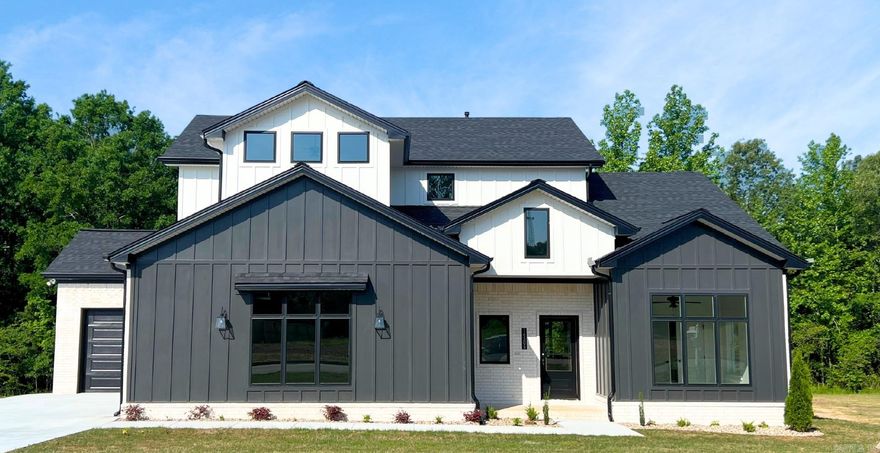 Move In Ready! Welcome to this meticulously crafted luxury home at Stonebrook in Maumelle. With its impressive layout encompassing 5 bedrooms, 3 bathrooms, and a spacious 3-car garage, this home provides abundant space for comfortable living and entertaining. The heart of this home is the stunning gourmet kitchen, which seamlessly flows into the dining area. The dining area offers picturesque views of the green space behind the home, creating a serene and tranquil atmosphere for every meal. Retreat to the main level's primary suite, where vaulted ceilings and an abundance of natural light create an inviting sanctuary. Pamper yourself in the full walk-in shower or unwind in the indulgent soaker tub, creating a spa-like experience in the comfort of your own home. The primary suite also features a convenient utility room access from the closet, providing ease and efficiency in your daily routines. A fully fenced yard, ensures privacy and security while providing a safe space for outdoor enjoyment. Upstairs, a versatile flex space awaits, perfect for a large media room where you can create your own home theater or relaxation area. Come see this one today!