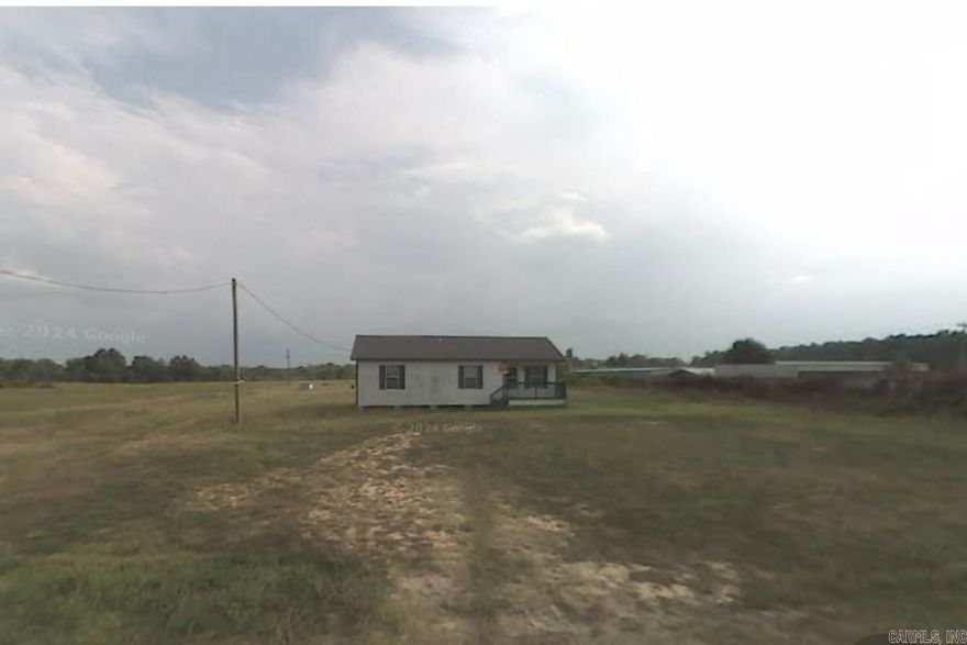 A full level acre. House is being sold "AS IS".