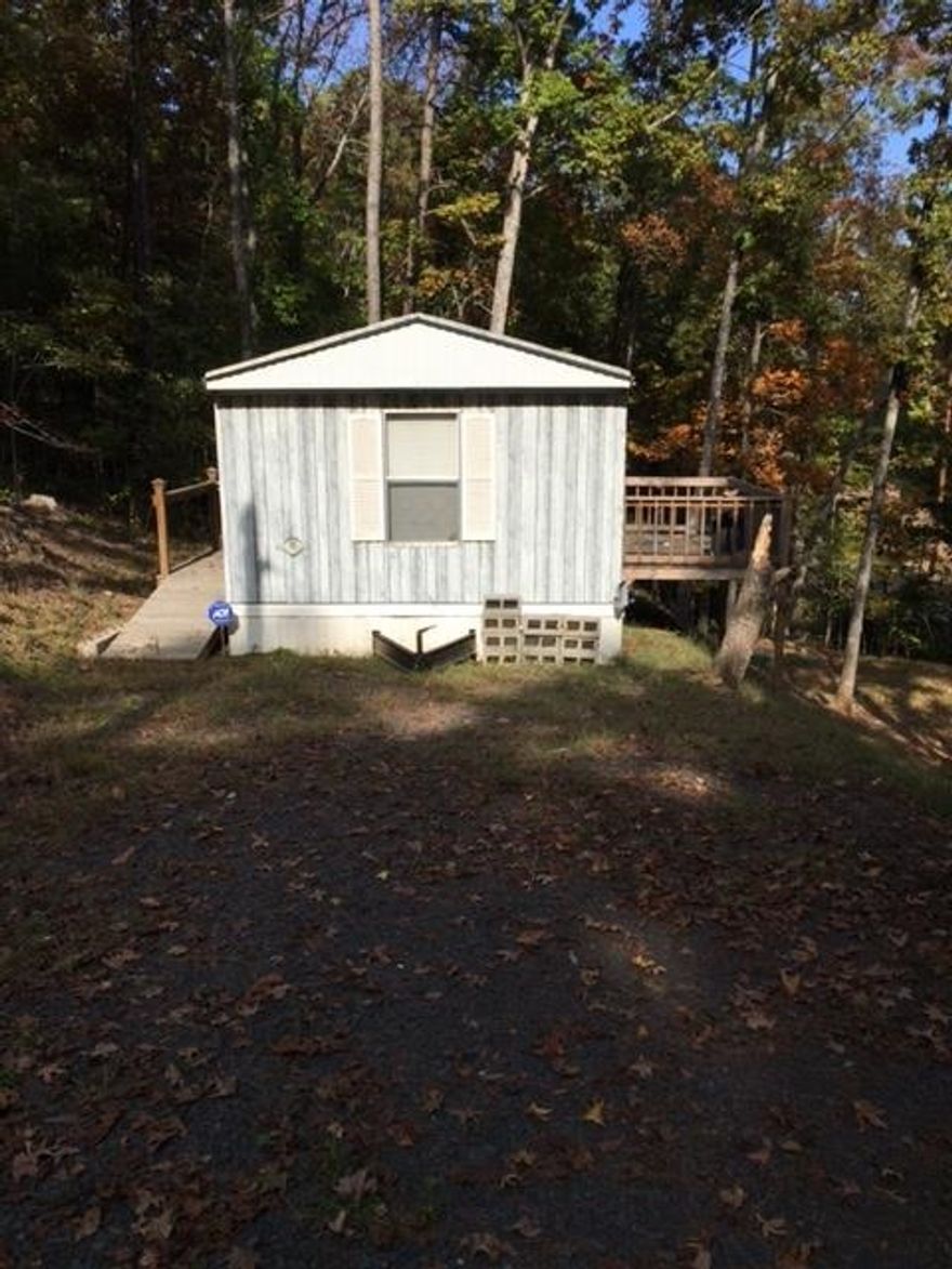 Great weekend hideout/ Hunting camp close to Cherokee WMA About 1 mile to Cove Creek Park and launch. Furnished to include W/D and kitchen appliances.Deck on front with wheel chair access to door.