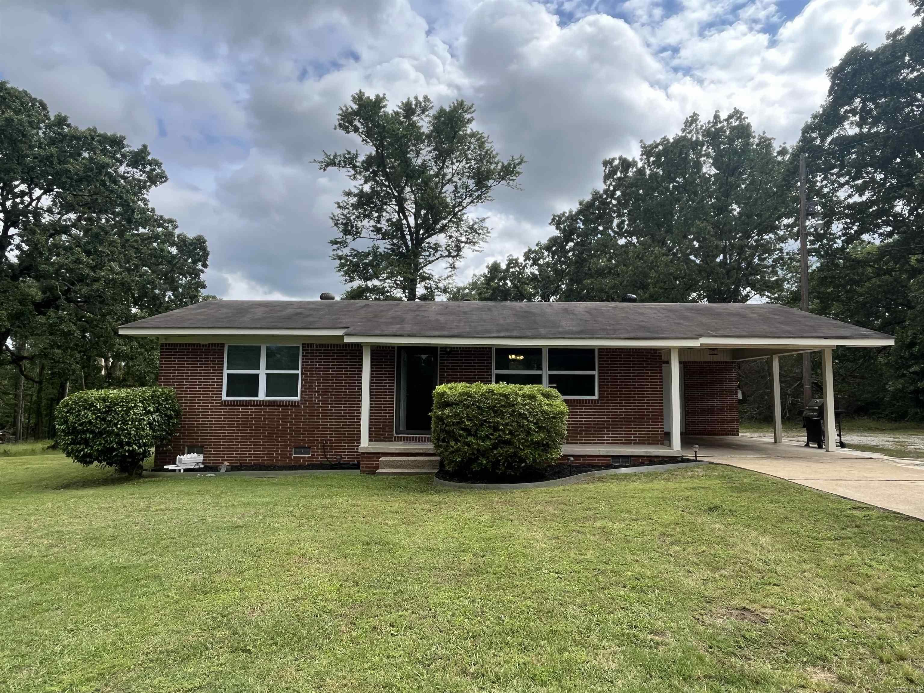 Take a look at this 2 bedroom 1 bath brick home in a fantastic location. Tons of new updates have just been completed on this well maintained home including a new HVAC system. You'll love the short 15 minute commute to Hot Springs, 3 minutes to Interstate 30 and 5 minutes from Walmart. Take action on this remarkable updated home perfectly situated on over an acre of land.