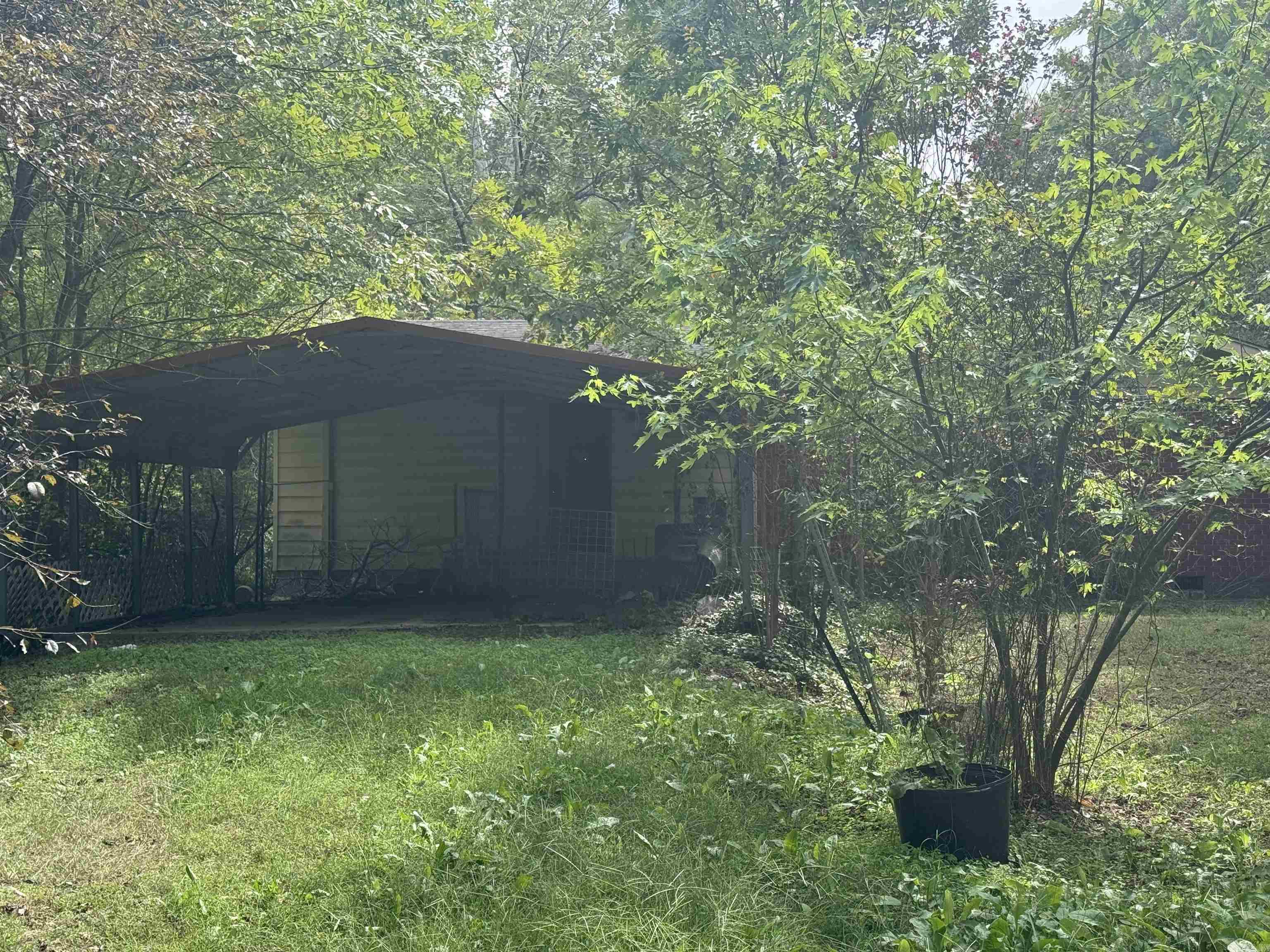 Brick, single family home in need of a renovation. Some demo has been done already so flooring is missing in areas. No interior access without a contract, but you are welcome to go look outside. This property has a beautiful lot with tons of potential. ARV is approximately 175-185,000.