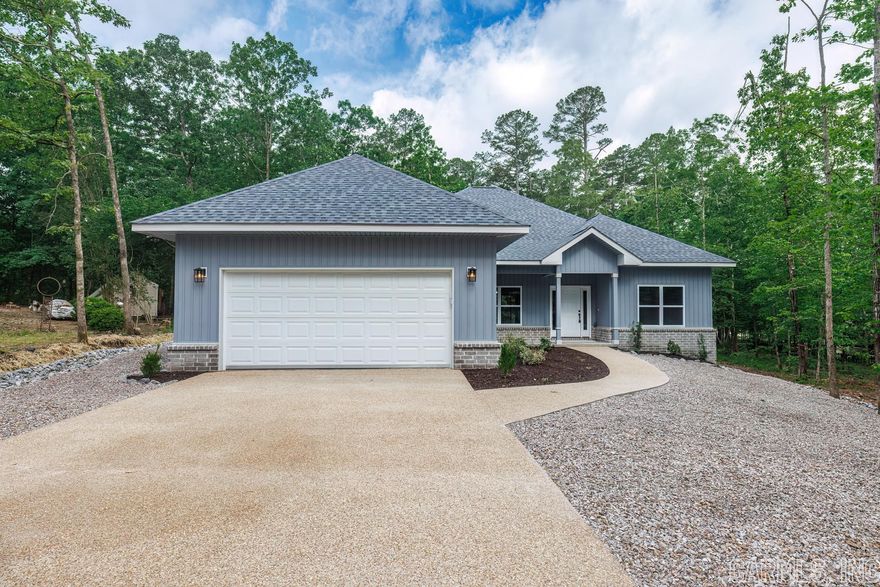 NEW CONSTRUCTION by Dream Builders LLC located in the Lake Coronado neighborhood. Great established neighborhood where you find neighbors helping neighbors. This one is complete and ready for you to move in!!!  Walk in to the open plan featuring ceiling details, custom trim package, custom cabinetry and island in kitchen.  Large walk in pantry will be the envy of every chef.  Divided bedrooms giving you and your guests the privacy desired.  Primary suite features divided vanity tops, soaking tub, walk in shower and generous walk in closet. Covered porches on the front and back ideal for nature watching. Builder one year warranty. Taxes lot only. See documents for floor plan. Agent Remarks.