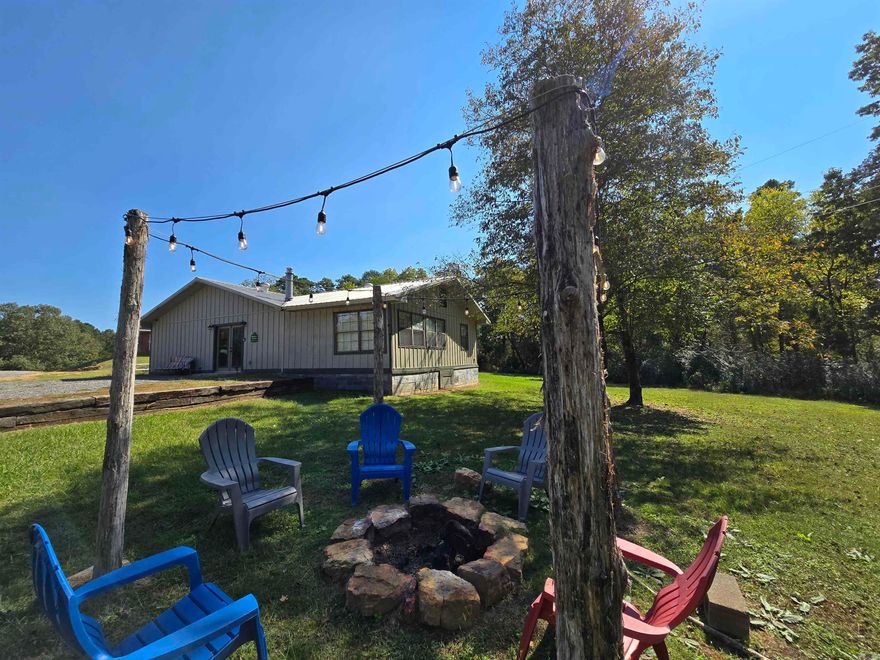 Introducing your dream lakefront getaway! This stunning, fully furnished home is move-in ready and located just a short stroll from the peaceful lakeshore. Whether you're seeking a profitable nightly rental or your own private retreat, this turn-key property is ready to perform. Offering 4 spacious bedrooms and 2 comfortable living areas, the open floor plan showcases warm pine wood walls and durable concrete flooring. Experience the lake lifestyle in this exceptional property — the perfect investment or forever escape. There is a 2nd lakefront home sitting on 1.26 acres next to this property that can be purchases as well.