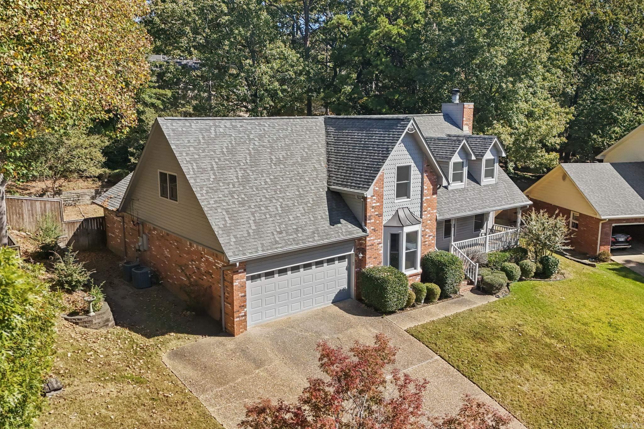 This home now has a fresh new look with a complete paint refresh throughout, including all cabinets! Discover this stunning 4-bedroom gem in the desirable St. Charles neighborhood of West Little Rock! The main level showcases brand-new luxury vinyl plank flooring (installed in May 2024) and a spacious master suite featuring a vaulted tray ceiling, luxurious whirlpool tub, separate shower, and a generous walk-in closet. The large kitchen is a chef’s dream, equipped with a butler’s pantry, island, double stainless steel ovens, induction cooktop (with optional gas hookup), Corian countertops, a beautiful backsplash, and a convenient desk area. The great room offers a cozy ambiance with a charming brick fireplace, while the formal dining room provides versatility as a home office. The 4th bedroom can double as a game room for added flexibility. Recent updates include a deck (2017), roof, and windows (2013). The property also includes a front and back sprinkler system and gutters. This home is a must-see! Schedule your showing today!!!