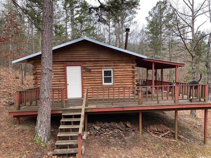 PRIVATE HUNTING ACREAGE IN THE OZARK MOUNTAIN AREA This off-the-grid hunting cabin is located outside of Melbourne, Arkansas city limits of Izard County. It is just 10 miles from the famous White River.  The 5 acre property features a working well, a creek, and it is located 1 mile from the black top road.  The log hunting cabin is approximately 800 square feet with 2 rooms and a wood cook stove. There is no electricity but could easily set it up for utilities. It does, however, have a handpump well on the property.  If you are looking for a private hunting getaway, this might just be the place. Priced to sell for just $69,900. The listing agent is related to the sellers of this property.
