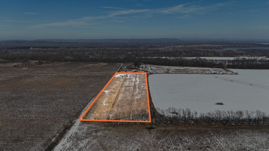 10+/- tillable acres in Carden Bottoms  10+/- acres of rich alluvial flood plain at the end of Carden Bottoms Rd at the foot of Petit Jean Mountain in northwestern Yell County. Class IIe Roxana silt loam soil, ready for hay production or row crop, Excellent access to this acreage from road frontage. Electricity on the roadway. Whether you are looking to add to your existing farm in the area or build  an out of the way hunting camp, this is the spot for you! Abundant waterfowl,dove and deer thrive in this region of the Arkansas River Valley. It’s only a short drive to Holla Bend National Wildlife Refuge and Petit Jean State Park.