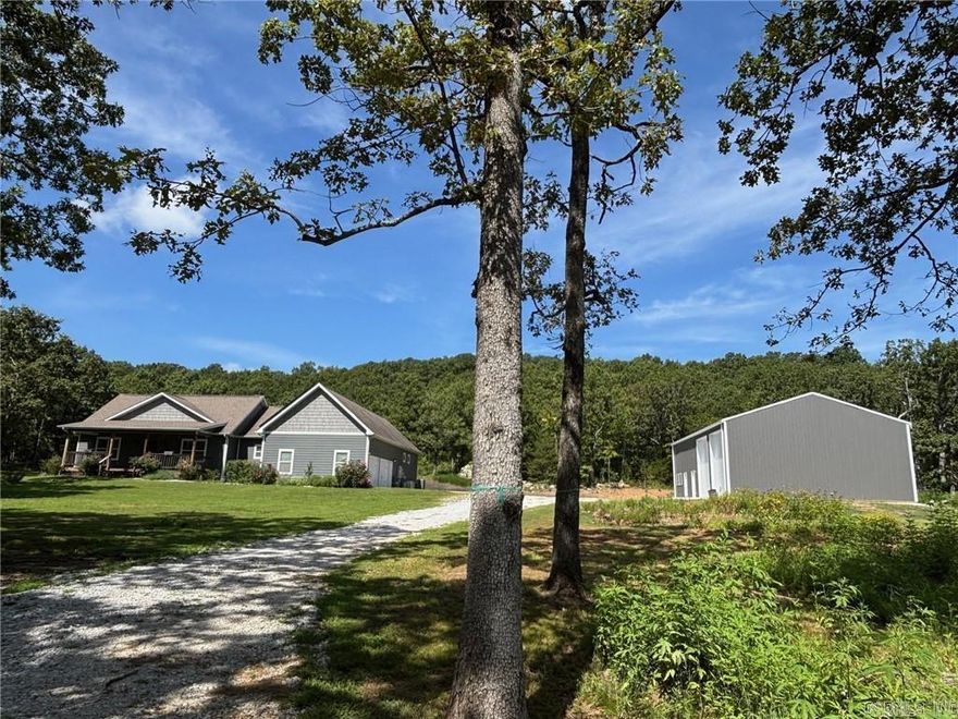 Check out this beautiful 3 or 4 bedroom contemporary ranch home with the option of a fifth sleeping area, media room, etc., if needed. Situated on 10.44 mostly wooded acres and featuring a 38'x54' shop with 14' overhead doors. Shop is partially plumbed for an office or studio apartment. There is also one of the most luxurious chicken coops you'll find! The home has a covered front porch and back deck to enjoy your mornings and evenings, and a long list of amenities! Rural location within minutes of Walmart and downtown Harrison allows you to have your chickens, with the convenience of town near by! Close to multiple fishing, hunting, camping, hiking, and sightseeing venues. Only 45 minutes to Branson MO, Table Rock, Taneycomo, and Bull Shoals Lakes, the White River, and within 20 minutes of the Buffalo National River. A great place to call home and enjoy the Ozarks! Average 12 month electric has run less than $28 a month due to the solar panels installed in 2023! Taxes are without homestead tax credit figured in.