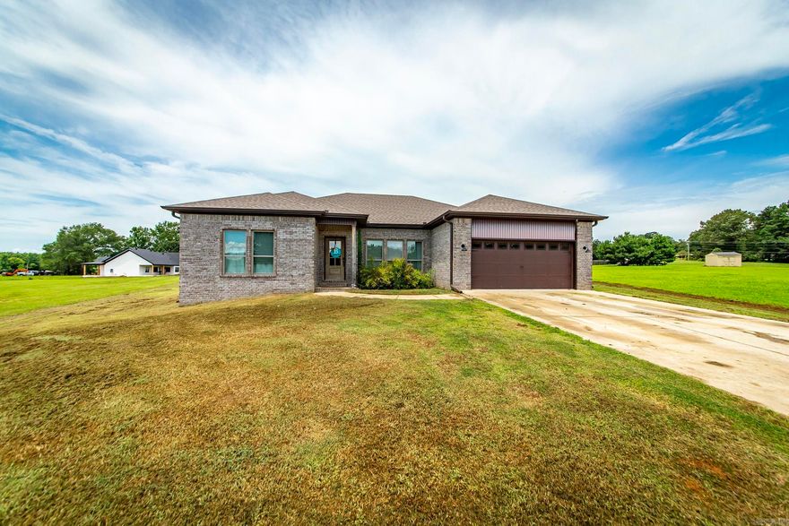 Welcome home to 74 Bella Grace. This home sits on 1.1 acres in the Cabot School District and has plenty of space both inside and out. The kitchen has marble counter tops with stained cabinet accents and plenty of storage space and stainless steal appliances. The kitchen is open to the living and dining areas making the home feel spacious and inviting. The wooden beams accents in the living room match those stained accents and flooring perfectly. The primary bedroom is large and spacious with an ensuite attached. Primary is split from secondary bedrooms. Country feeling but close to town. Call today to schedule your private showing.