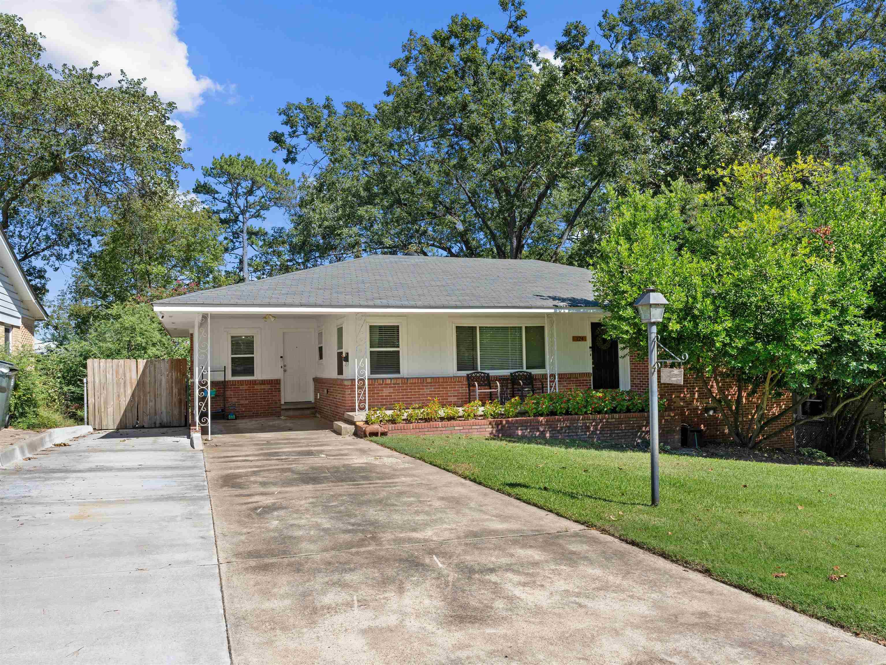 This inviting home in the Kingwood area has everything you need! While keeping the charm of the original home, you will still find plenty of updates! Starting with the additional concrete driveway for extra parking, new water heater in 2020, all new windows, paint and total HVAC system in 2021, and all new blinds, dishwasher, stove and vent-a-hood in 2024! You'll find beautiful hardwood flooring throughout most of the home. The tiled bathrooms keep the vintage charm style with pops of a modern twist. The kitchen boasts tile countertops and in eat-in kitchen. Enjoy the extra space with a separate pantry and laundry area! Step into your screened in porch for a night of entertaining, or onto the additional deck for even more space that was added in 2018! Enjoy the large backyard with additional storage shed on a permanent foundation. This home offers all of this and more! Come see it today!