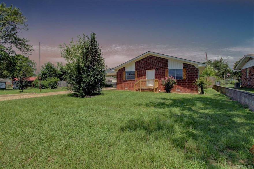 NEW PRICE!!! This beautiful 4 bedroom 2 bath home is located in the heart of Morrilton close to parks and shopping.  This home has just been updated with a new roof, new deck, new interior paint, new flooring, new lighting, new granite counter tops in the kitchen and both bathrooms, new SS appliances, new cabinets, and more.  Don't miss out on this great space buy.  This is a Fannie Mae HomePath property so go to www.homepath.com to submit offers and to get information on how the seller may pay up to 3% in buyer's closing costs.  See agent remarks.