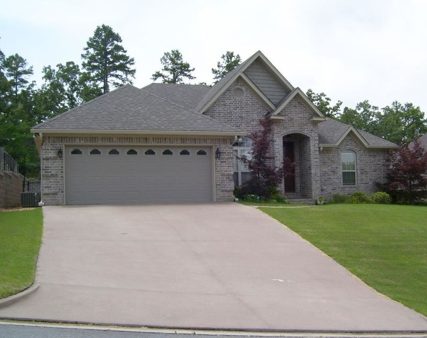 This home has so many extras, upgraded stainless Kitchen Aide appliances with double oven,5 burner gas range,double drawer dishwasher, trash compactor. Breakfast area and Formal dining area. Hardwoods in entry, dining and living area. Iron fenced in backyard allows view to green space with privacy fence on sides to neighbors. The patio features covered and uncoverd space