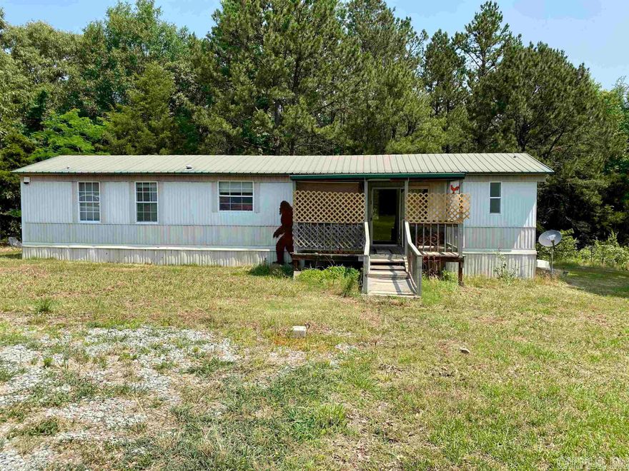 2 Bedroom/2 Bath 16X60 Manufactured home with 30x40 Workshop. Home sitting on 6.45 acres with pond and woods. Home being Sold AS IS. Please see Agent Remarks