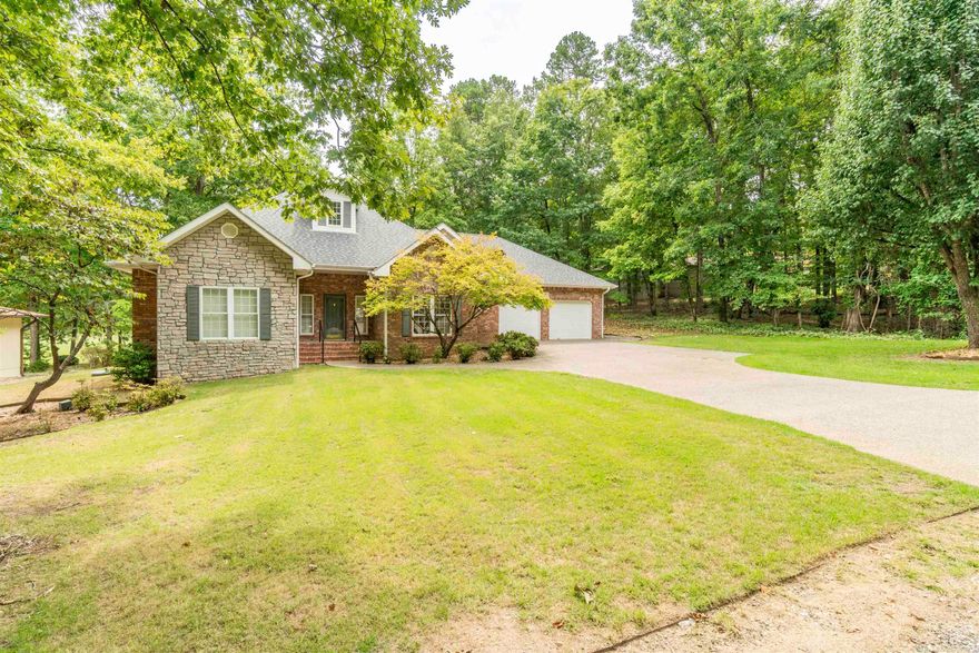 This charming one-level Cortez Golf Course home, is beautifully situated on the fairway of hole #3, features steel framing and concrete slab construction. This inviting residence offers a perfect blend of comfort and style, featuring 3 bedrooms and 2.5 baths, with the primary bedroom showcasing a sitting area and direct access to the back deck. The split floorplan ensures privacy, with a convenient office and half bath located off the kitchen and foyer. The spacious living room is bathed in natural light.  The home also includes a spacious laundry room that connects to the primary closet. Recent updates include a roof replacement in 2023, fresh paint in the living room, dining room, kitchen, foyer, and hallway, as well as stylish new kitchen countertops. The property features a level driveway, an oversized garage, and a gently sloping backyard that seamlessly blends into the lush golf course.