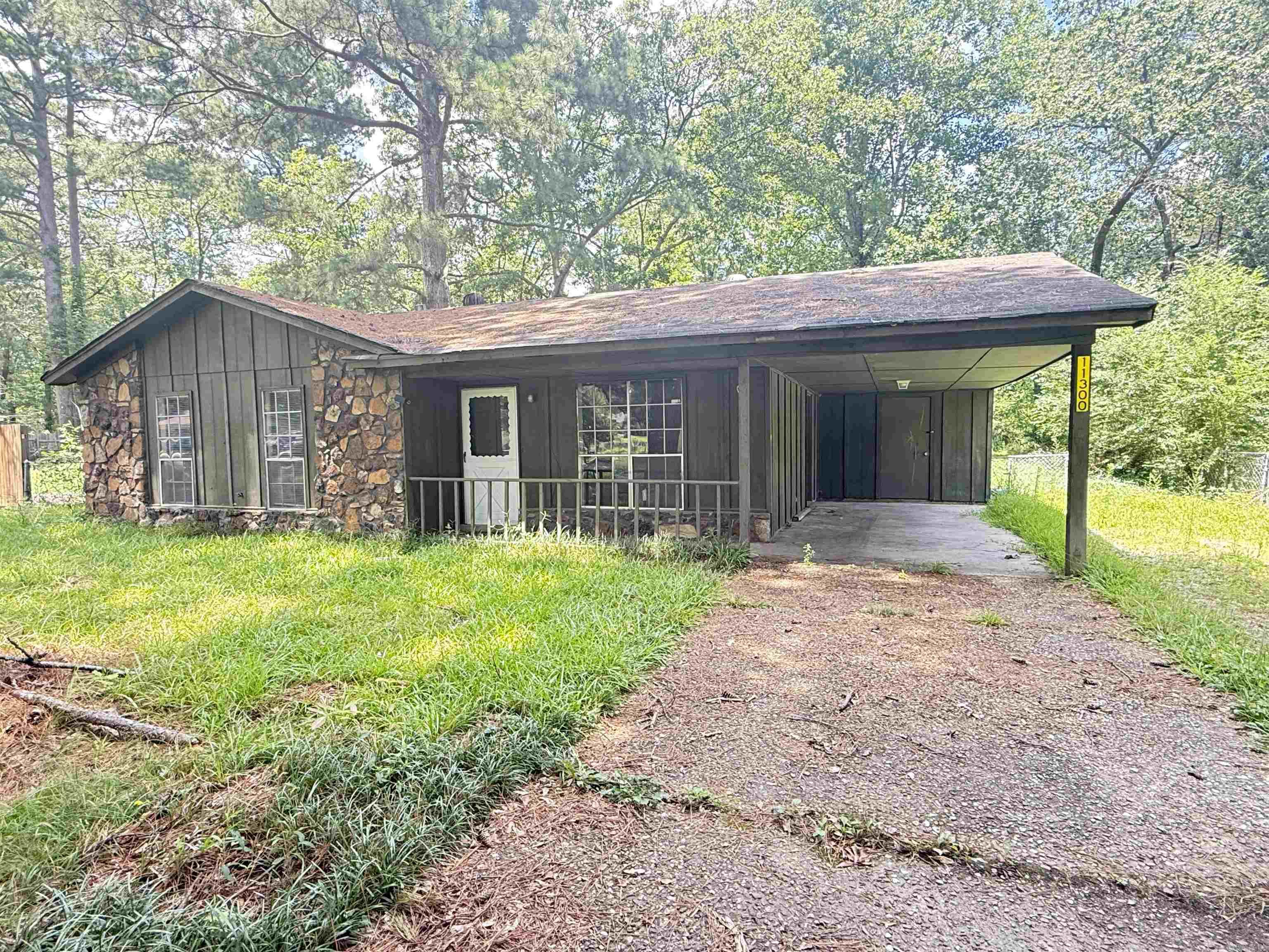 Great fixer upper for a starter home or great for investors. Great rental history. 3 bedroom, one and a half baths. Eat in kitchen with a breakfast bar. Sliding back door opens to a nice patio and over a half acres lot.