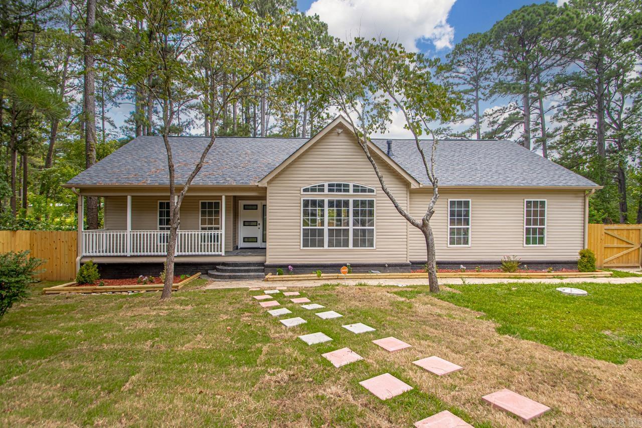 Prime Location ā Fully Renovated with Pool & Deck on Half an Acre! This beautifully updated 4-bedroom, 2-bath home offers over 2,200 sq. ft. of living space on a spacious half-acre lot. Tucked away in a quiet setting, yet close to everything, youāll love the privacy and layout this home provides. The open floor plan features vaulted ceilings and a gas fireplace in the main living area, creating a welcoming space for everyday living or entertaining. The kitchen has been fully updated and includes a large, open layout. You'll also find thoughtful touches throughout, like the unique black tiles and updated finishes. The primary suite includes a jetted tub for relaxing after a long day, and the converted garage adds a bonus flex space, currently set up as a game room. Outside, enjoy both a covered front porch and a covered back patio that leads to a large deck. With a brand-new roof (2025) and a newer AC, major updates are already taken care of. This home checks all the boxes: space, style, and functionality. Come take a look and see why itās the perfect place to call home.
