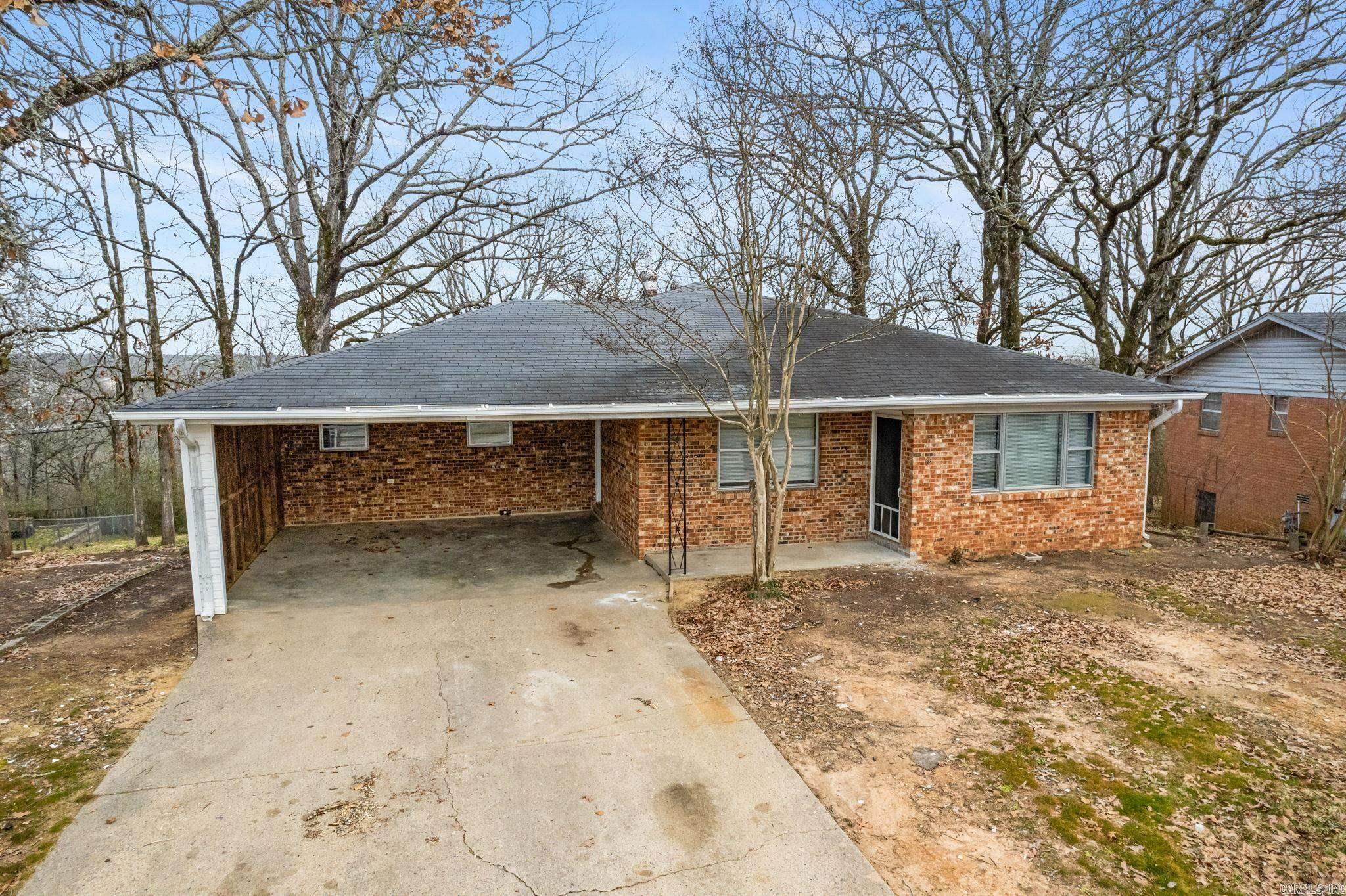 Fully renovated 3-bedroom, 2-bath home with a walk-out basement, offering flexible living space or a potential extra bedroom. Modern updates throughout, including new flooring, fresh paint, updated kitchen and bathroom cabinets, fixtures, and hardware. Enjoy scenic ridge views from the spacious patio on a lot over half an acre. Conveniently located near Burns Park with easy access to hiking, biking, and golf. Available nowāschedule your private tour today!
