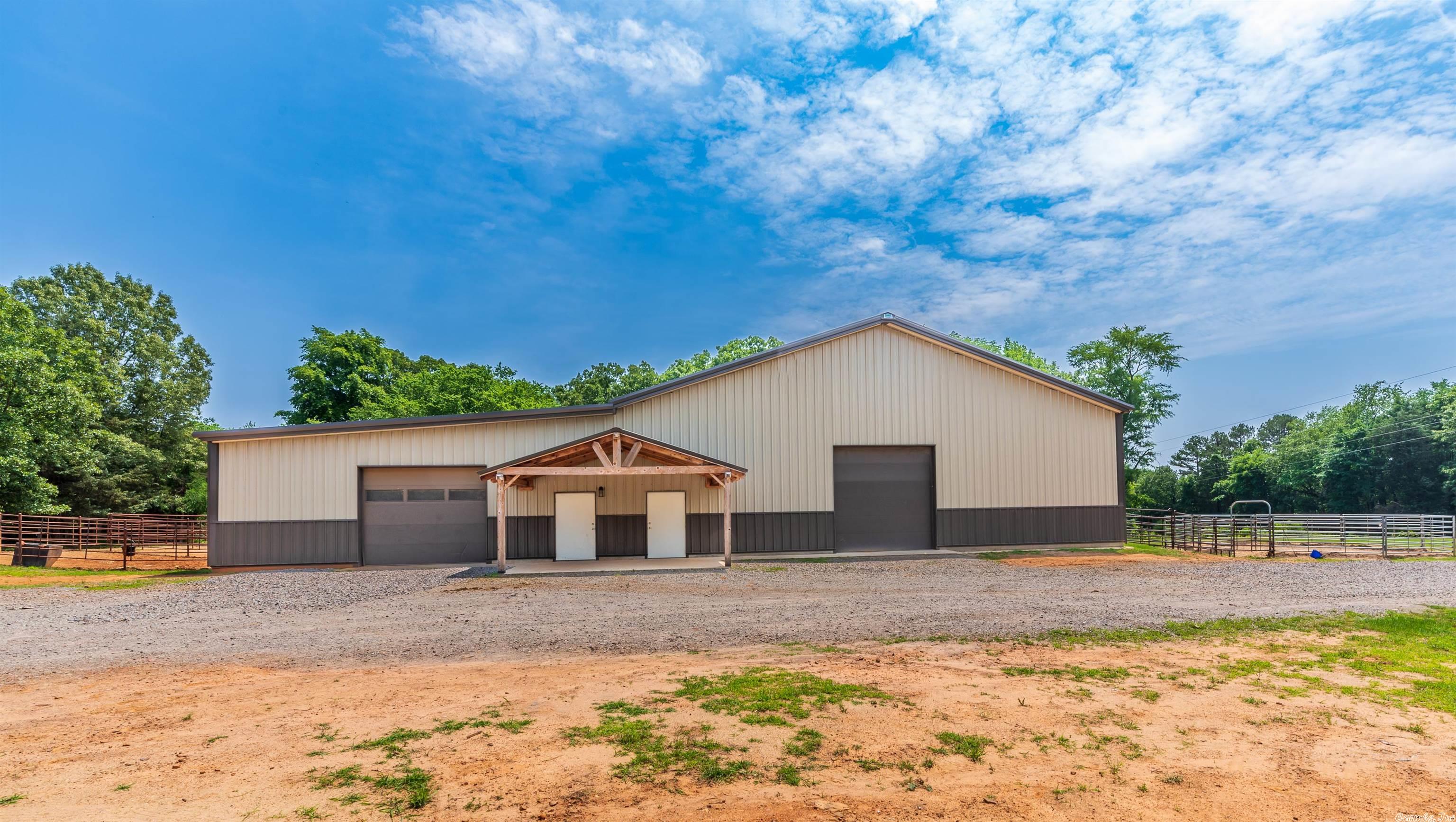 Amazing opportunity to own a full equestrian training facility on 25.33 acres in Hunt, Arkansas! The beautiful residence on this estate is a 2,396 sq ft home. 4 bed/ 2.5 bath with a huge living area, cozy den with pellet fireplace insert, and big kitchen. Tons of updates throughout the home some include new carpet, HVAC unit, and new paint. The huge horse training facility includes: the stall area that is 38'x75', 6 stalls, 3 of which have pipe metal outdoor runs. All complete with a covered 60'x75' riding arena, 1 wash stall with hot water, 1 tack room, grooming area with customer window, and feed room. This property boasts 360-degree views of the mountains, pasture, and the back of the property. This estate has new pipe metal and barbed wire fencing around all the grazing pastures.