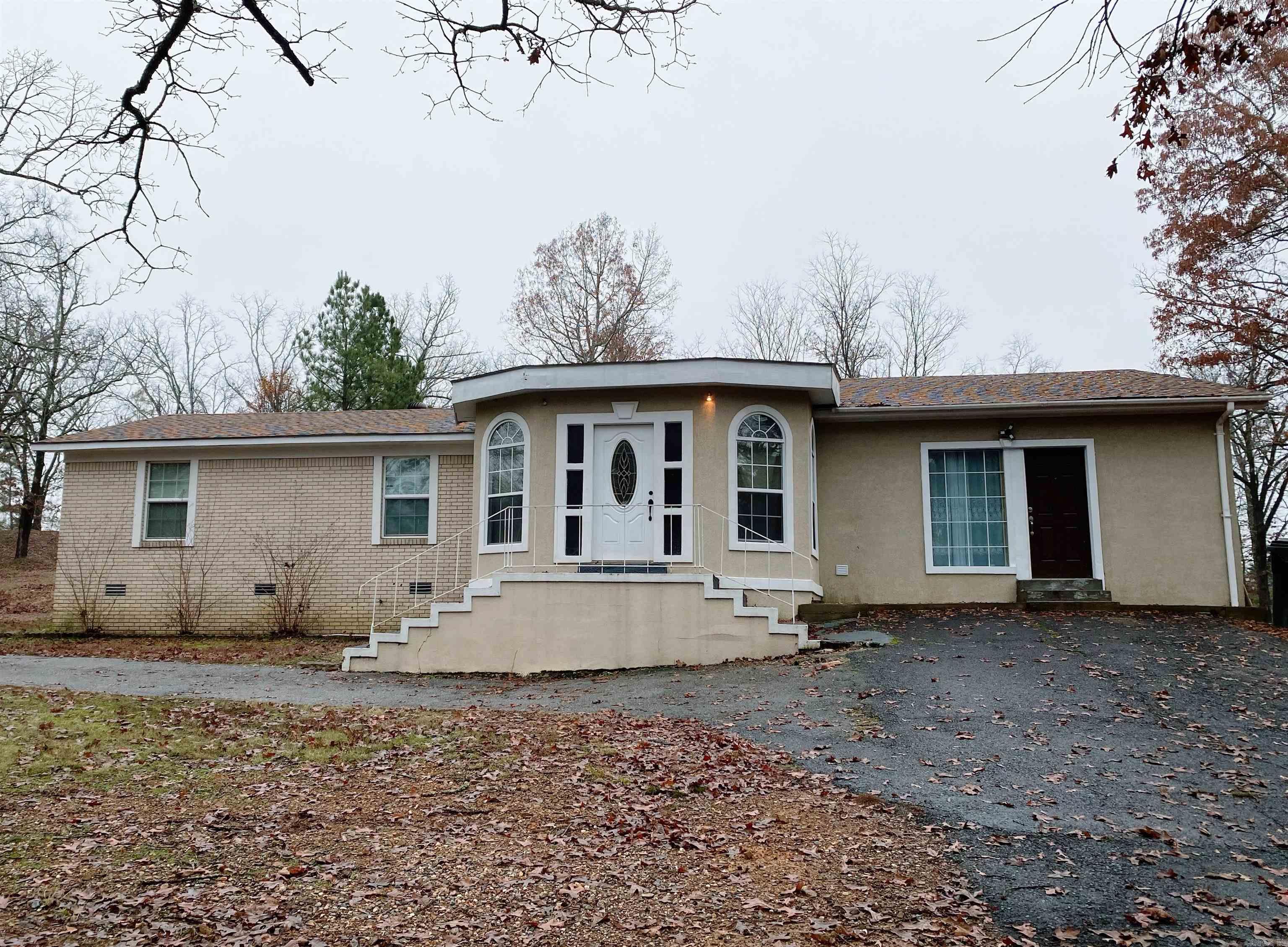 Welcome to this beautiful property in Pearcy, AR! Nestled on nearly 2 acres of peaceful land, this home offers 3 spacious bedrooms, 2 full bathrooms, and a versatile bonus room that can be tailored to your needs. The open-concept living area is perfect for entertaining, while large windows throughout the home invite plenty of natural light. This home is conveniently located near schools and essential amenities. With almost 2 acres to call your own, you'll enjoy privacy and room for outdoor activities, gardening, or potential expansion. Don't miss the opportunity to make this serene retreat your forever home!
