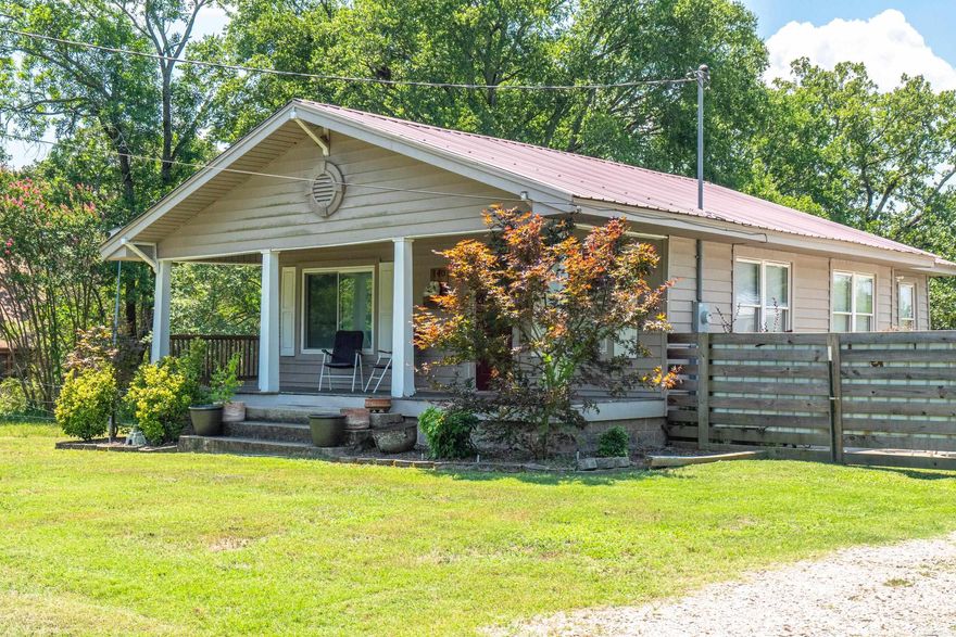 THIS 2 BEDROOM 1 BATH HOUSE  COMES FURNISHED AND HAS STR PERMIT NEWLY UPDATED READY TO GO .  FRONT PORCH,PATIO,CARPORT W/STORAGE CURRENTLY IN STR PROGRAM