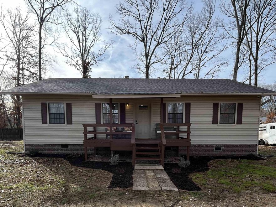 Come see this beautiful home, completely remodeled inside and ready to welcome you home. Enjoy a large, fenced in private yard from the deck or the front porch. Inside you will find new floors, doors, paint, light fixtures, granite countertops, and appliances. It also has upgraded plumbing, new electrical box and a new roof. You will find a country feel but only minutes from the city. Don't miss out on this great property, schedule your showing today!