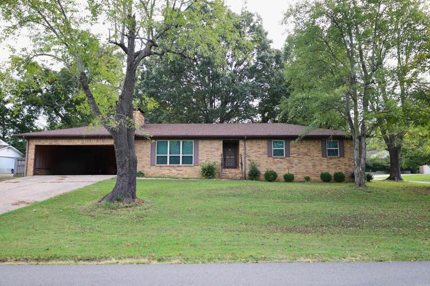 3-bedroom, 2-bathroom home located at 125 S 12th Street in Paragould, AR. Enjoy the added bonus of a convenient shop and a covered back patio- perfect for outdoor relaxation or entertainment!!! Additionally, there's an adjacent lot available for purchase, providing an excellent opportunity to expand the property or maintain privacy. This home's timeless brick exterior, corner lot location, and evident care make it an ideal choice for those who appreciate classic charm and endless potential. Don't miss out on this unique opportunity to transform this well-loved home into your dream living space! **A LOT BEHIND HOUSE CAN BE PURCHASED for an additional $25,000.