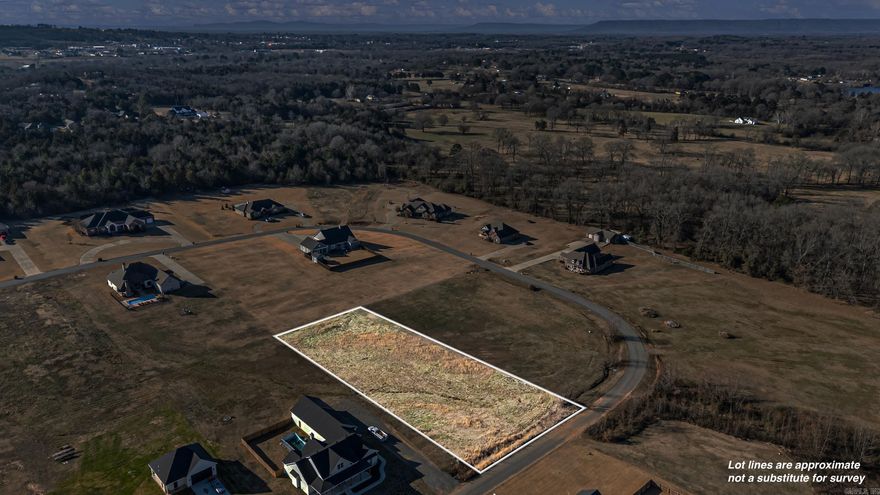 Build your dream home on this 1.2± acre lot located in the highly sought-after Woodlands Subdivision, just outside of Morrilton, Arkansas. This beautiful property offers the perfect blend of privacy and convenience, with a peaceful, wooded setting while remaining just minutes from town amenities, schools, and shopping. Enjoy the space and flexibility that larger acreage provides, all within an established neighborhood known for its attractive homes and quiet surroundings. Utilities available at the road (buyer to verify). Don’t miss this rare opportunity to own a premium lot in one of the area’s most desirable subdivisions!