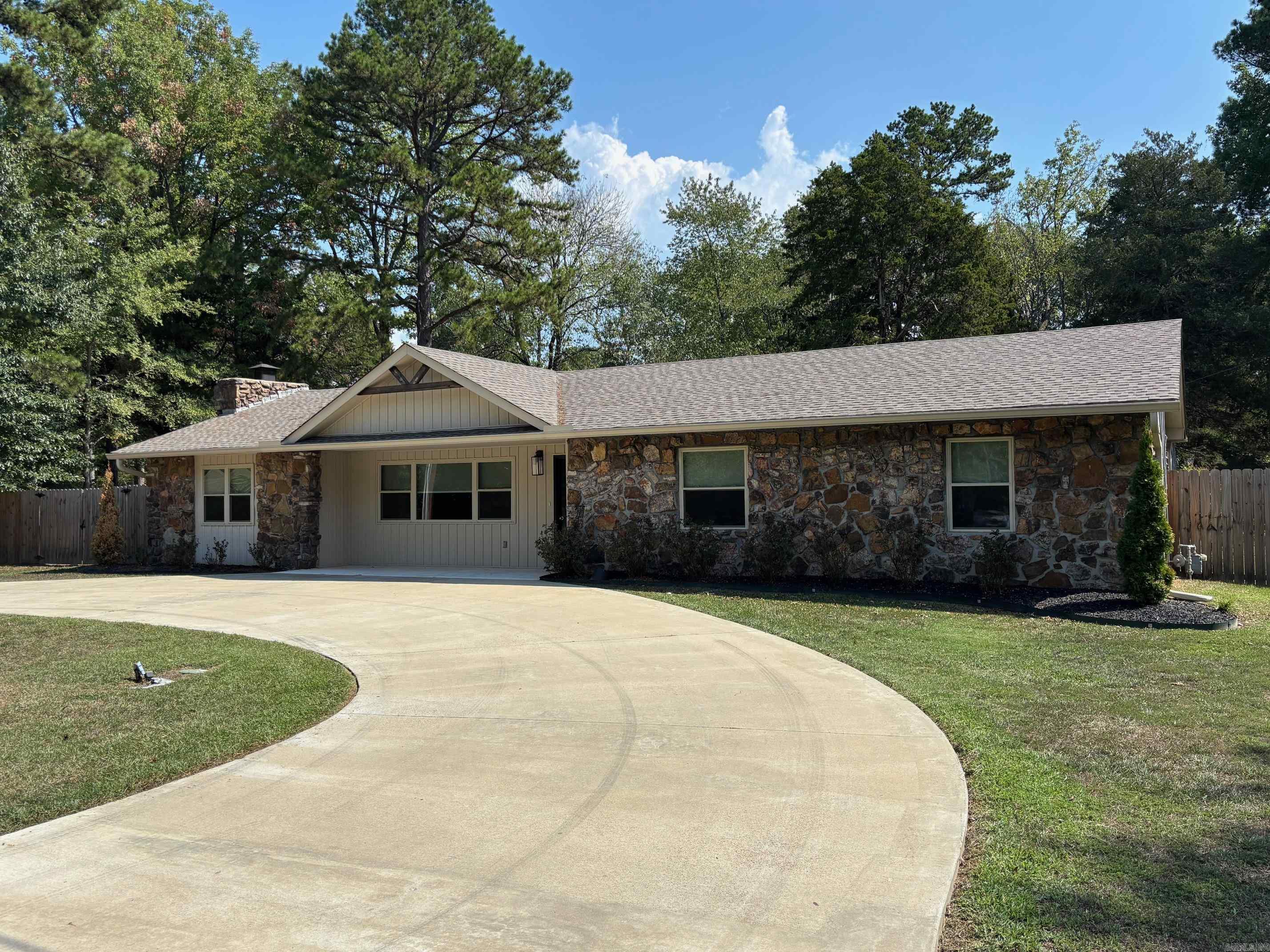 Nicely updated one story home with 3 bedrooms and 2 baths in the heart of Heber Springs with an easy walk to school and/or Sandy Beach. New luxury vinyl plank flooring, recently remodeled kitchen and baths, fresh paint and custom roller window shades throughout make this home "move-in ready"! The fully fenced backyard is spacious and private with a covered patio off the kitchen. It even has a new storage building! HVAC system is only 2 years old and the almost new refrigerator stays.
