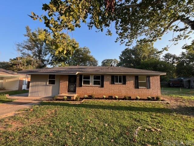 Two bedroom and a sunken den with fireplace in addition to welcoming size living room make this a perfect home. Recently installed roof, window, bathroom, new kitchen, heavy sliding back door, and a new deck are added bonuses! All new luxury vinyl plank floors button up this beauty. Go and show! Won’t last.