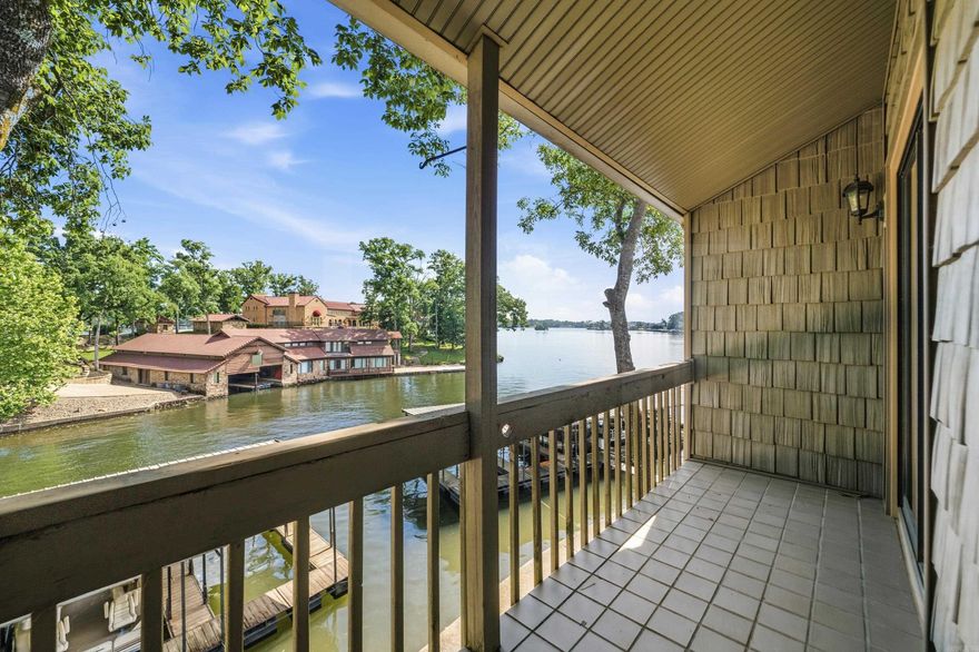 This stunning 2 bedroom, 2 bathroom condo at The Moorings complex offers the epitome of lakefront living on Lake Hamilton. Situated inthe coveted 7 South area, the prime location is highly sought-after. As you enter the condo, you're immediately struck by the gorgeousviews of the lake through the abundance of natural light pouring in. The living area boasts a cozy wood-burning fireplace, perfect for coolevenings. The spacious primary bedroom is a true retreat with a luxurious en-suite bathroom and walk-in closet. Step out onto thecovered patio and take in the breathtaking lake vistas while enjoying your morning coffee or evening cocktails. This unit is a true gem,offering a rare opportunity to own one of the best units in the highly coveted Moorings complex. Adding to the allure, the condo comeswith a covered boat slip, allowing you to seamlessly transition from your waterfront oasis to the serene waters of Lake Hamilton. Don'tmiss your chance to make this slice of paradise your own.