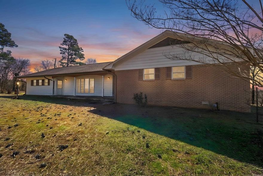 Rare opportunity to own approximately 13.75 acres inside the city limits of Glenwood with direct frontage on the beautiful Caddo River. Properties offering this much acreage in town — with river access — are truly hard to find.  This 5 bedroom, 3 bath split-level home offers approximately 2,304 sq ft of living space and is perfectly positioned to capture both mountain and river views right from the deck. Enjoy serene mornings overlooking the water, evenings by the woodburning fireplace, and the privacy that only acreage like this can provide.  The property features a 2-car detached garage/shop, a pond, and open ground suitable for livestock — giving you flexibility for hobby farming, recreation, or simply room to roam.  Whether you're looking for a spacious full-time residence, a riverfront retreat, or an investment opportunity to create a unique short-term rental experience on the Caddo River, this property offers incredible potential in an unbeatable setting.