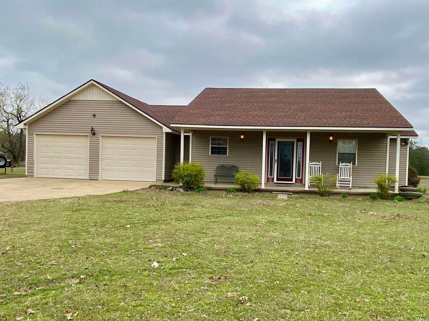 Welcome to the market 2108 N 11th! This charming property sits in a well desired neighborhood on over an acre of land. It features an open floor plan, vaulted ceiling, a large pantry, a safe room and so much more! Enjoy the fresh air and tranquil views while sipping coffee and enjoying all that country living can offer. This house features not only an oversized front porch but also offers a large screened porch on the back that's great for winding down after a long day. Luxury vinyl plank floors throughout the home and a very large peninsula that perfect for meal prep or entertaining guests! Enjoy the good life and small town living on this beautiful corner lot in Augusta! Call today for a personal tour of this desirable property!