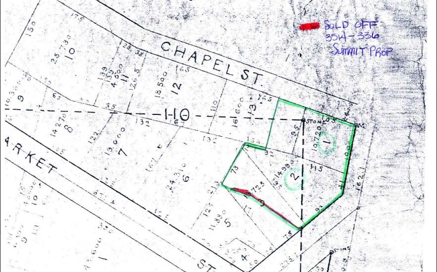 Great open lot in prime location downtown Hot Springs. 818 Central Ave, a spacious parking lot, is also included.