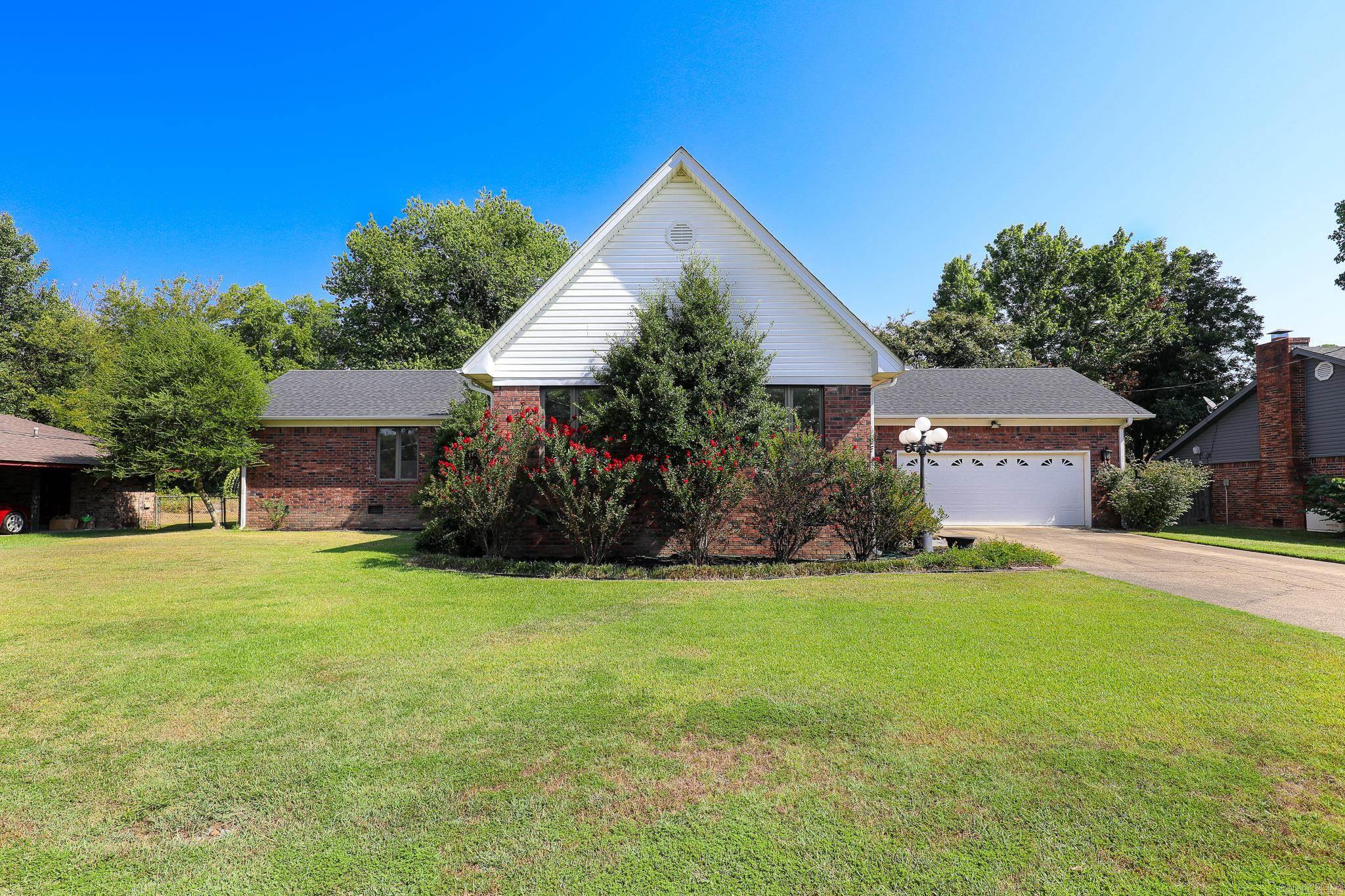 What a buy for Downtown Benton! This immaculate home offers you over 4,000 sqft to live, play and entertain! Main floor with over 3.100 sqft has 3 bedrooms, 2 1/2 baths, huge formal living room with a formal dining, big galley kitchen, serving bar with another dining area, hearth room with fireplace, 2 oversized bedrooms and a massive Primary suite! Big windows and great storage and closets throughout! Downstairs is a huge game room/ office/man cave, large enough for all three! Downstairs features another full bath, another fireplace and a safe in addition to closets galore! Kitchen has wall ovens, downdraft stove top, drawers that pull out to both side of bar, extra storage on serving bar! Primary bath has a wall of closets, jacuzzi tub and 24 karat faucets. This custom built home also has features such as temperature controlled foundation vents, basement has double-walls, sprinkler system for the yard, large 2 car garage with a backyard door, gas hook-up for grill on patio. Listed below Appraised Value!! This is Lots of Home in downtown Benton that just needs your personal touches!