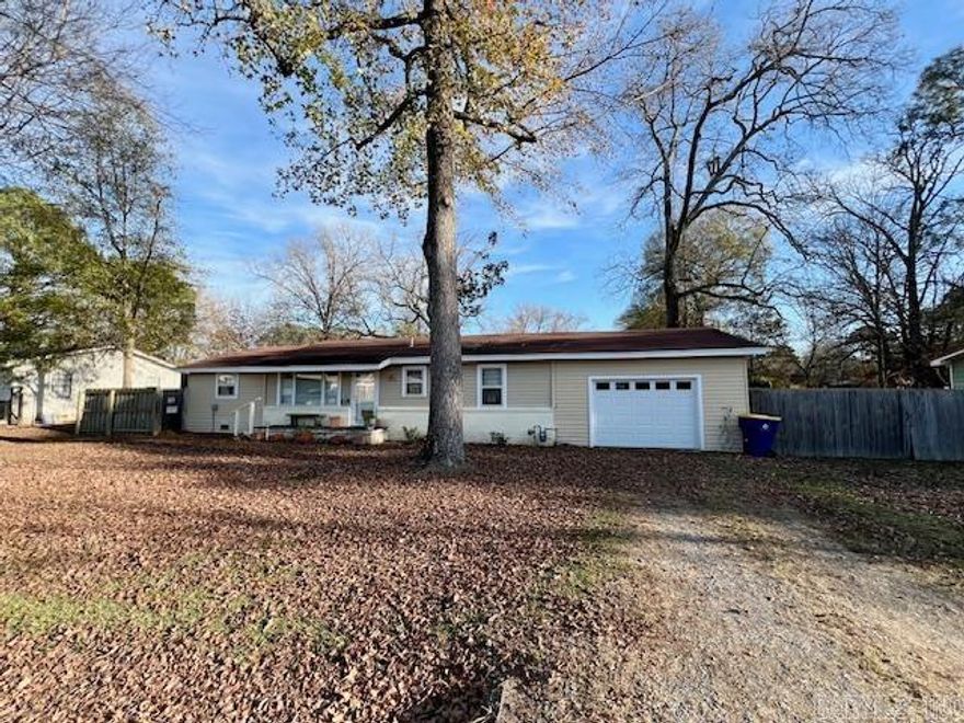 Charming and full of potential, this 3-bedroom, 1-bath home also features a flexible den that could easily serve as a 4th bedroom, home office, or playroom. The large living room showcases beautiful wood floors, while the kitchen offers tile backsplash, ample cabinetry, and brand-new flooring that continues into the flexible den/4th bedroom area. Generously sized bedrooms provide comfortable living throughout, and the laundry room includes the perfect space for a pantry or additional storage shelving. Outside, you’ll find an oversized garage with plenty of room for tools, equipment, and organization, plus a huge fully fenced backyard ideal for entertaining, pets, or play. Call today to schedule your personal tour!
