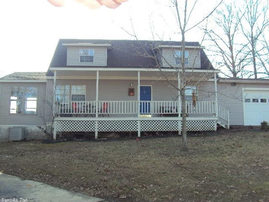 Remodeled, updated and spacious both inside and out, this 3 bedroom, 3 bath home on 1.5 acres has all you want for a country home! Great room plus a sunny bonus room, kitchen granite and stnless appliances and 2 large storage rooms at the end of the oversized 2 car garage! Master suite is downstairs and both upstairs bedrooms have their own baths! Large laundry room and a wrap around around back deck. Long covered front porch greets your guests. You will love the setting and convenience of this sharp home!!