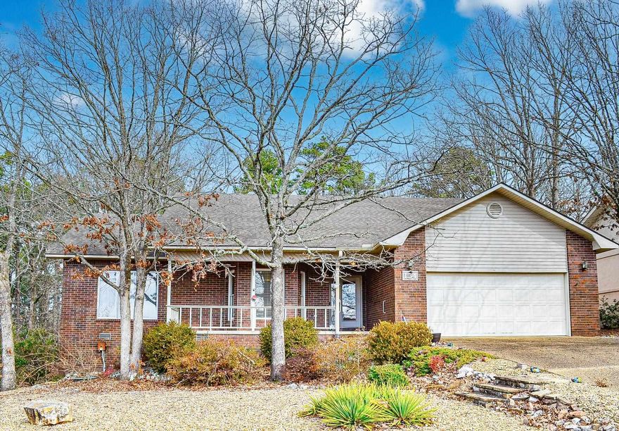 Welcome to your lovely new home with glistening oak hardwood floors in open concept living space and bedrooms, plenty of light from lots of windows (some with wooden blinds) and a chef's kitchen featuring Bosch gas stove and dishwasher, Kenmore fridge and a stainless Farm sink. Corian countertops and plenty of storage also. There are 3 bedrooms, with one having a Murphy bed for guests, or it can be used as an office. The spacious master bath has a walk in shower and a walk in tub to sooth your muscles.  The home has been very well maintained, with the HVAC replaced in 2022, also top of large deck replaced and extra wide steps added to the fully fenced backyard. There is a full house generator and propane tanks for the fireplace and stove. Castano Drive is very convenient to the West Gate of Hot Springs Village and is a lovely peaceful street.  Gated 26,000 Acre Hot Springs Village has 11 Lakes & 9 Golf Courses, Fitness Center, Swimming Pools, Beaches, Tennis, Pickleball, Mini Golf, Walking Trails, Clubs & Many Activities.