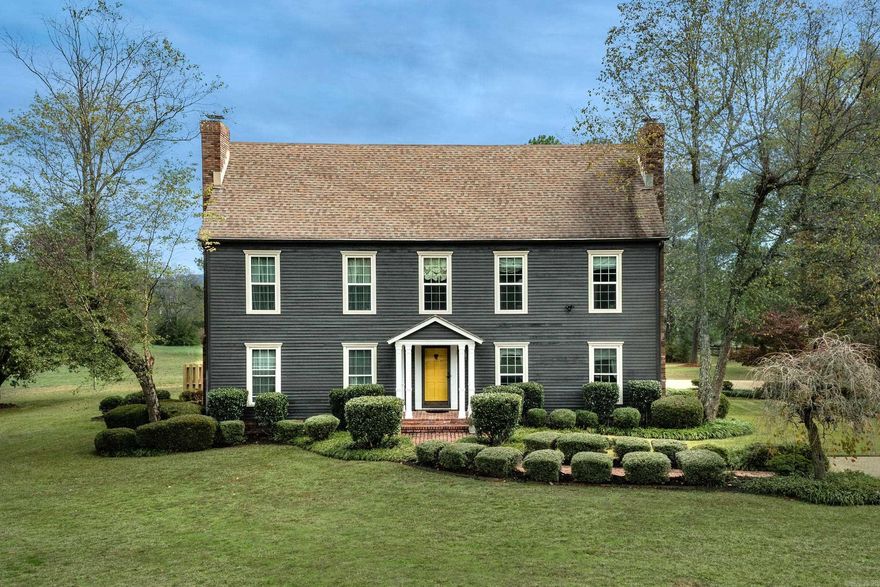 New England architechtural home on 4.95 acres in heart o fWLR, level, easy to maintain, landscaped with 12 station irregation system, custom designed solar powered gated entrance, in-ground gunite pool, patio, gazebo, tennis court, half bath, and inclosed storage in garage. Eat-in kitchen, formal dining, family room, laundry, powder room & master suite down, 4 beds & 2 bath up, 2 WBFP with gas start, loaded with molding, solid wood doors and old world charm.